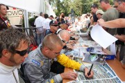 Autograph session of the participating drivers