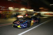Action in the pitlane by night